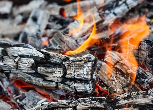 pngtree-burning-embers-and-fiery-coals-of-charred-wood-photo-image_38230970